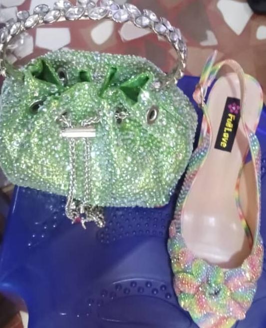 Green rhinestone bag and matching sparkly heels