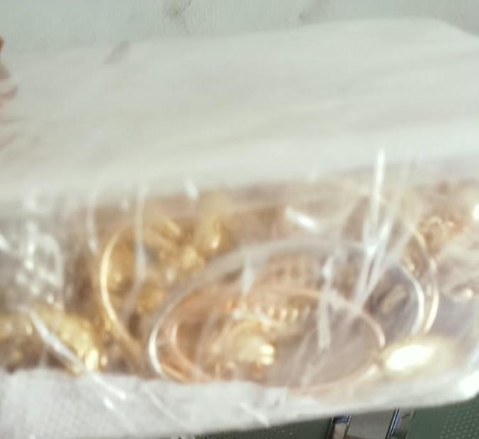 Gold jewellery sealed in a clear bag